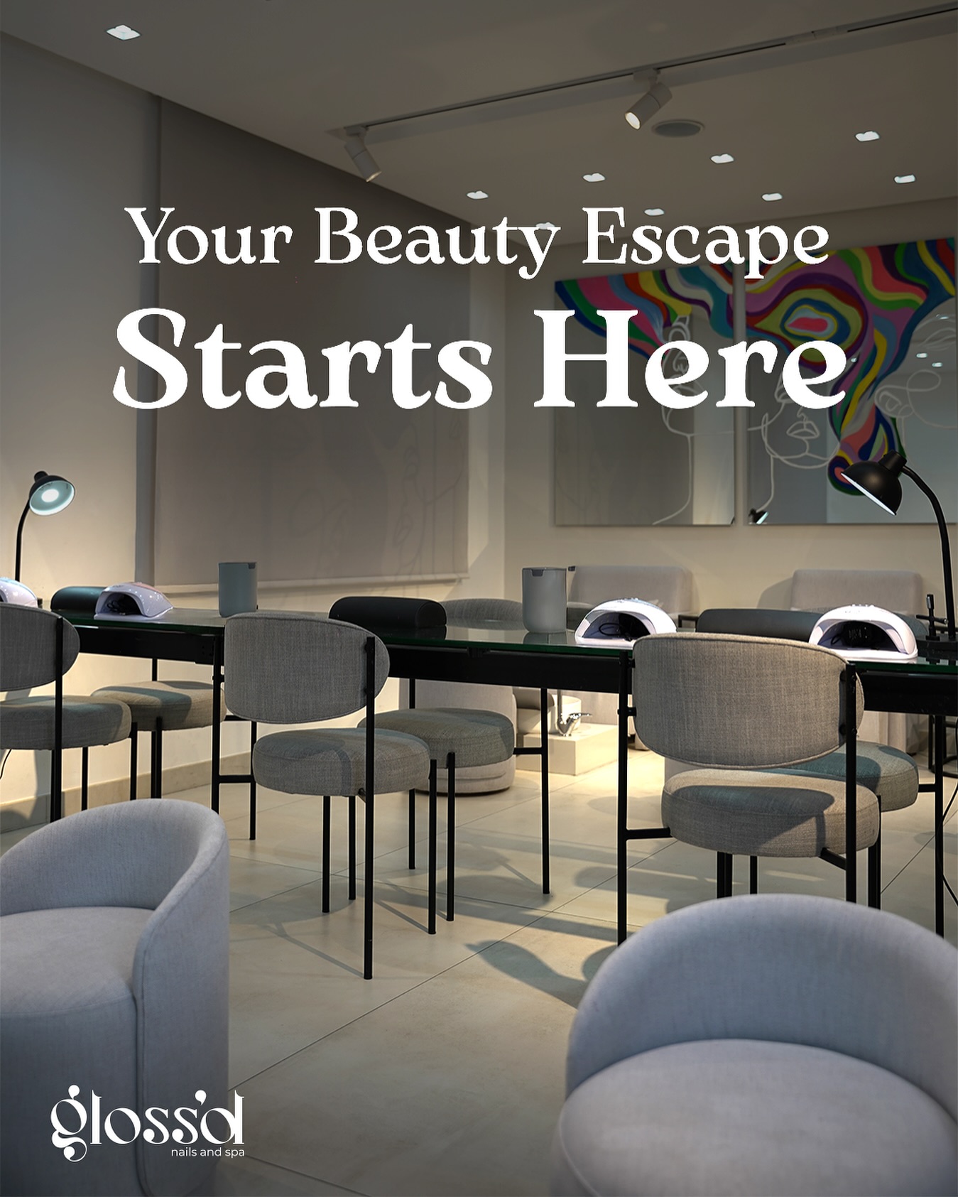 Modern Glossd nail salon interior with manicure stations and contemporary seating